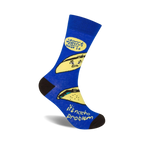 Crew socks in blue with a fun taco pun: 'I don't wanna taco 'bout it, it's nacho problem.'  Features cartoon tacos and yellow text.