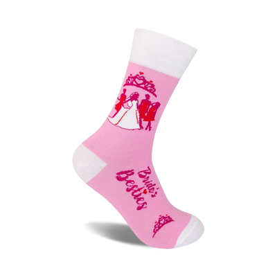 crew socks in pink and white with a silhouette of a bride, groom, and two bridesmaids. text on socks reads "bride's besties