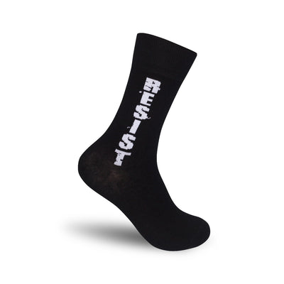 black crew socks with resist printed in white block letters.  