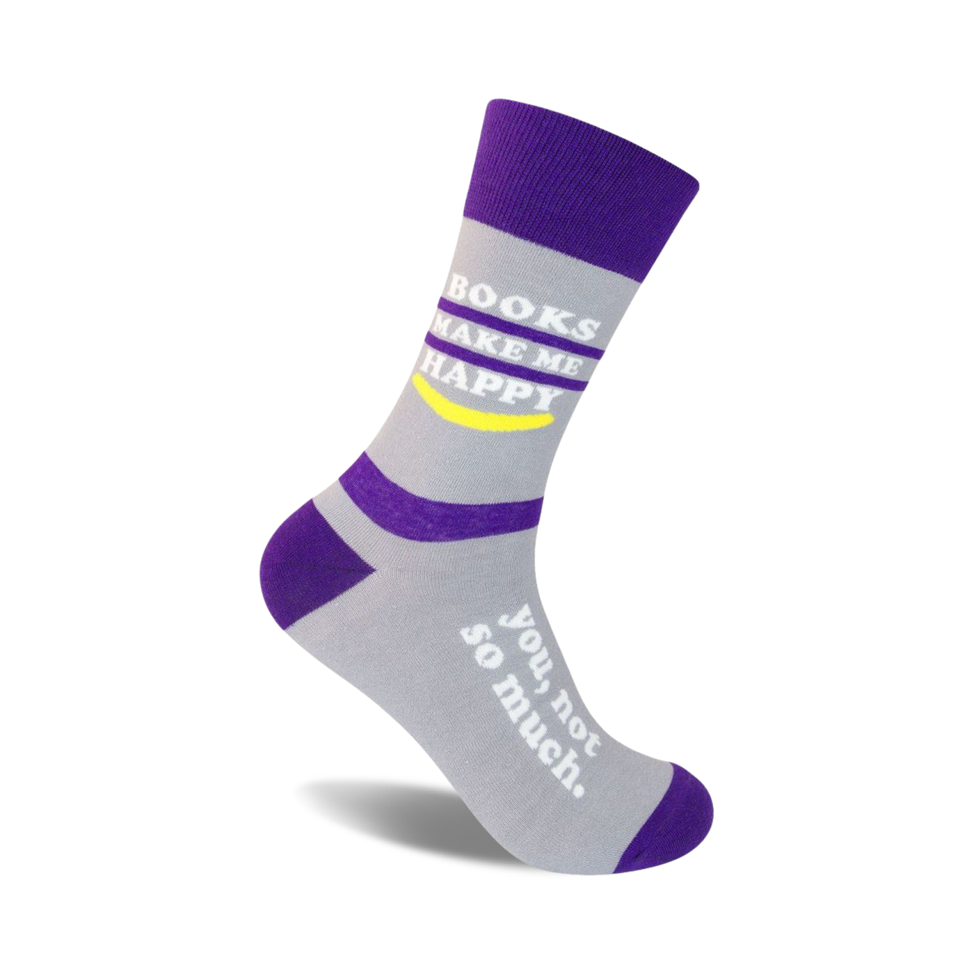 Crew socks in gray and purple with white text reading, 'Books Make Me Happy' and 'You, not so much.' A yellow smiley face is also featured.