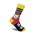 Crew socks in yellow, red, and black, featuring a bold 'Show Me Your Kitties' graphic with playful cat faces.