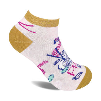 ankle socks with pink flamingo in yellow shirt and blue hat playing golf. features text "pho real" on the cuff.  