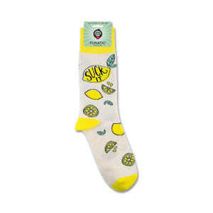 A pair of white socks with lemons and the words 