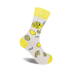 Cream crew socks with a yellow cuff, featuring lemons and the phrase 'Suck It' in a playful design.