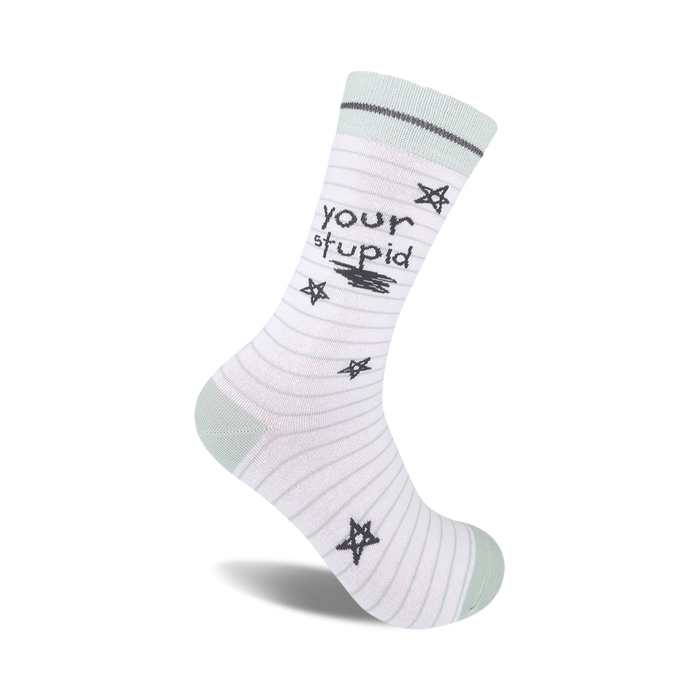 white sock with green stripes that say 