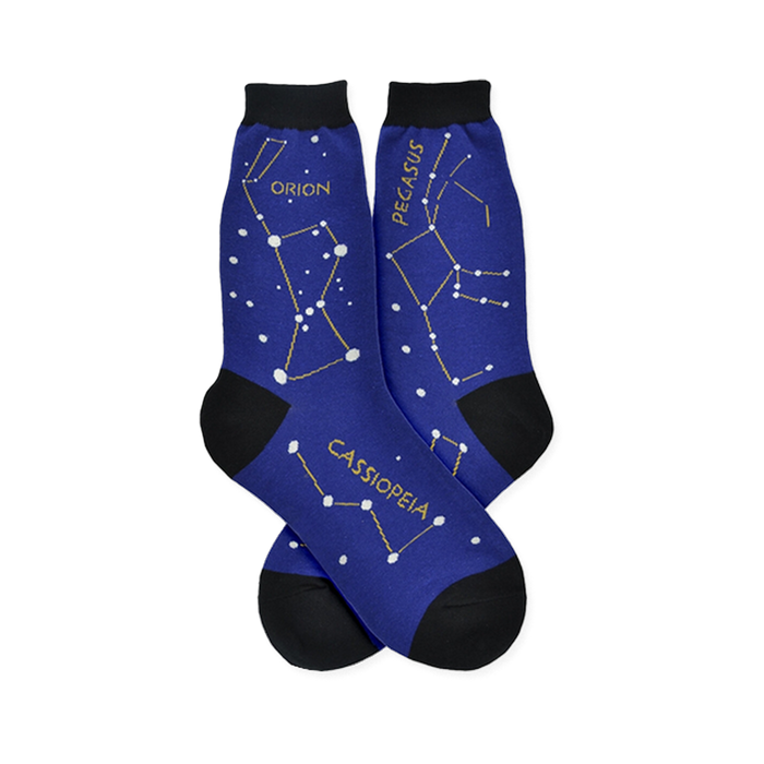 Dark blue Constellation socks featuring Orion, Pegasus, and Cassiopeia constellations with white stars and yellow lines. }}