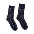 Pair of navy blue crew socks with a white library card design.  'Author', 'Title', 'Date Due', and 'Borrower's Name' are printed on the socks.