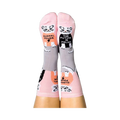 Pair of pink and grey cat socks worn on feet, showing "GURRRL POWER" and "THE FUTURE IS FELINE" text.