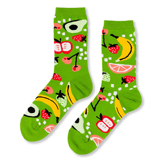Pair of crew socks in bright lime green, patterned with yellow bananas, red strawberries, apples, avocados, cherries, and grapefruit slices.