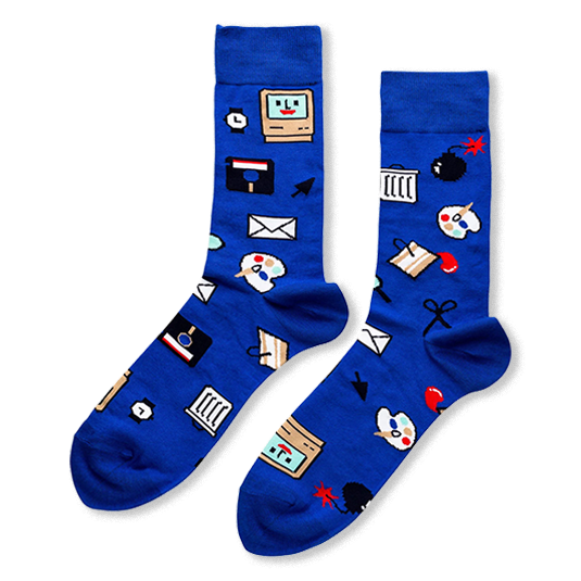 Royal blue socks featuring a pattern of retro computer icons like a smiling monitor, floppy disk, bomb, and paint palette.