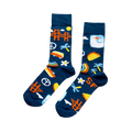 A pair of dark blue crew socks featuring orange Golden Gate Bridges, yellow suns, white clouds, green palm trees, "SF" text, and tacos.