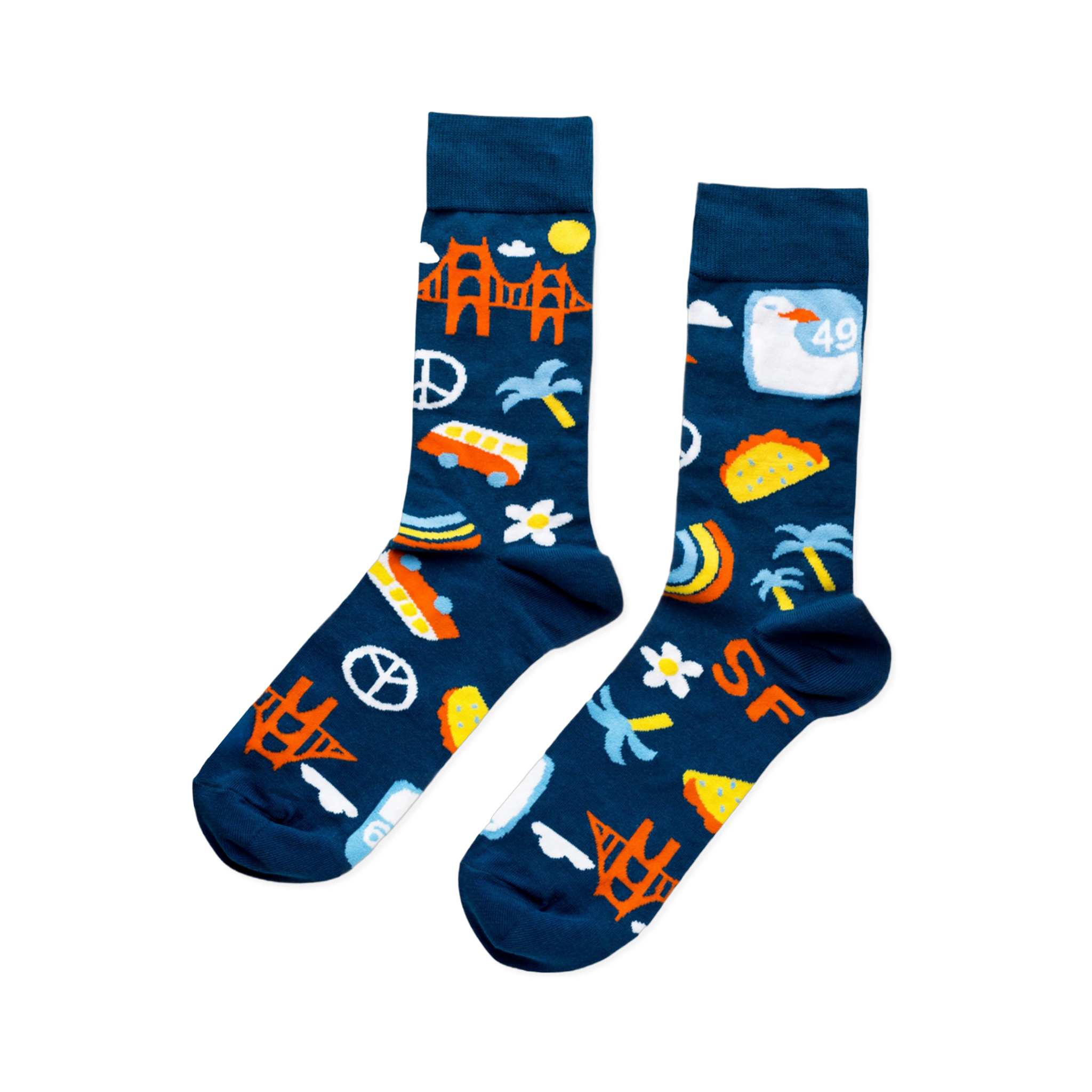 A pair of dark blue crew socks featuring orange Golden Gate Bridges, yellow suns, white clouds, green palm trees, "SF" text, and tacos.