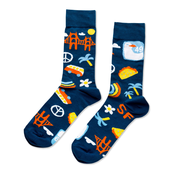 A pair of dark blue crew socks featuring orange Golden Gate Bridges, yellow suns, white clouds, green palm trees, 