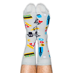 A person wearing light grey NYC patterned socks with their legs pointing straight up against a black background.