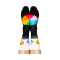 Person standing, wearing black crew socks with white cuffs and colorful, segmented color wheel designs on feet.
