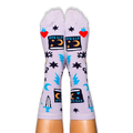 Person wearing light purple socks featuring black spellbooks, red flaming hearts, blue lightning bolts, and all-seeing eyes.