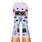 Person wearing light purple socks featuring black spellbooks, red flaming hearts, blue lightning bolts, and all-seeing eyes.
