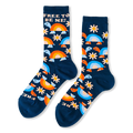 Navy blue crew socks covered in smiling turtles and white daisies with FREE TO BE ME text near the cuffs.