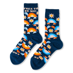 Navy blue crew socks covered in smiling turtles and white daisies with FREE TO BE ME text near the cuffs.