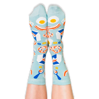 Front view of a person wearing light blue breakfast socks with their legs extended upwards against a dark background.