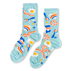 Light blue crew socks with a breakfast pattern showing fried eggs, bacon, milk cartons, donuts, and coffee cups.
