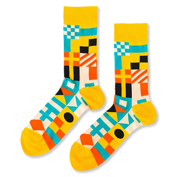 Pair of crew socks with a vibrant geometric nautical flag pattern in yellow, blue, orange, black, and white.