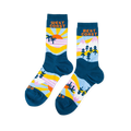 A pair of mismatched crew socks with West Coast beach scenes (sun, palm trees) and Best Coast mountain scenes (peaks, pine trees) on a dark teal base.