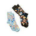 Two pairs of breakfast pattern crew socks: one dark background, one light blue, laid diagonally on a white surface.