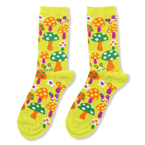Pair of bright yellow crew socks with an all-over pattern of orange, green, and purple mushrooms, colorful butterflies, and white flowers.