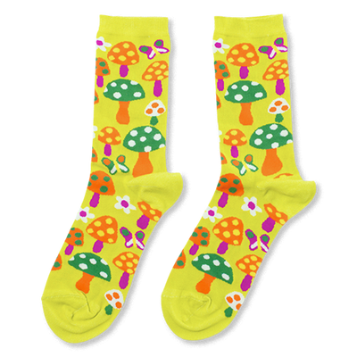 Pair of bright yellow crew socks with an all-over pattern of orange, green, and purple mushrooms, colorful butterflies, and white flowers.