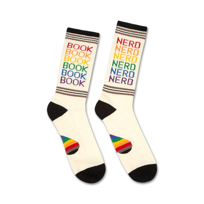 white and black crew socks featuring a rainbow pattern of "book nerd" graphics.  