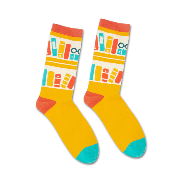 yellow crew socks with blue toes, heels and a pattern of red, orange, blue, and green books.    }}