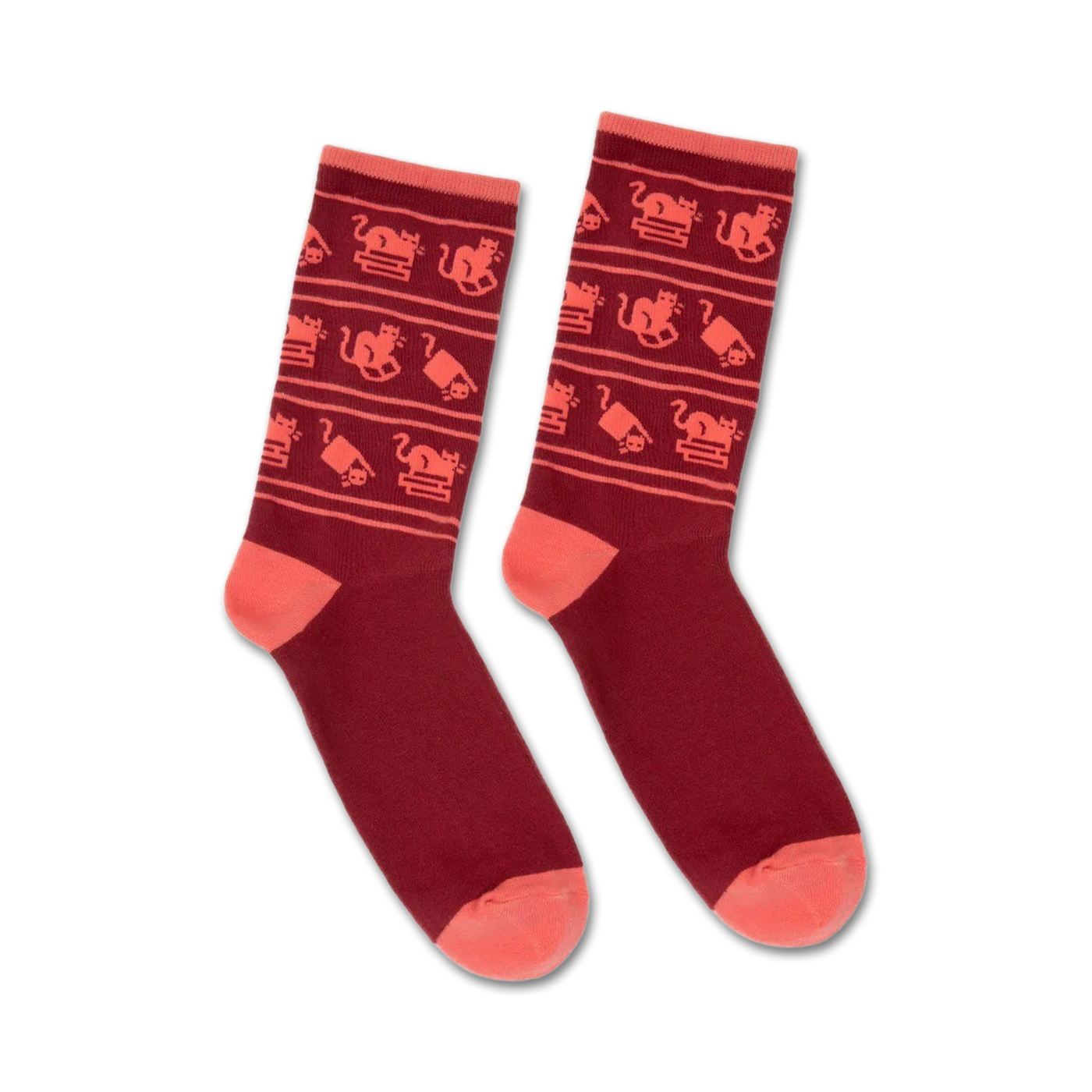 Pair of burgundy crew socks with a playful pattern of coral cats and stacks of books. 