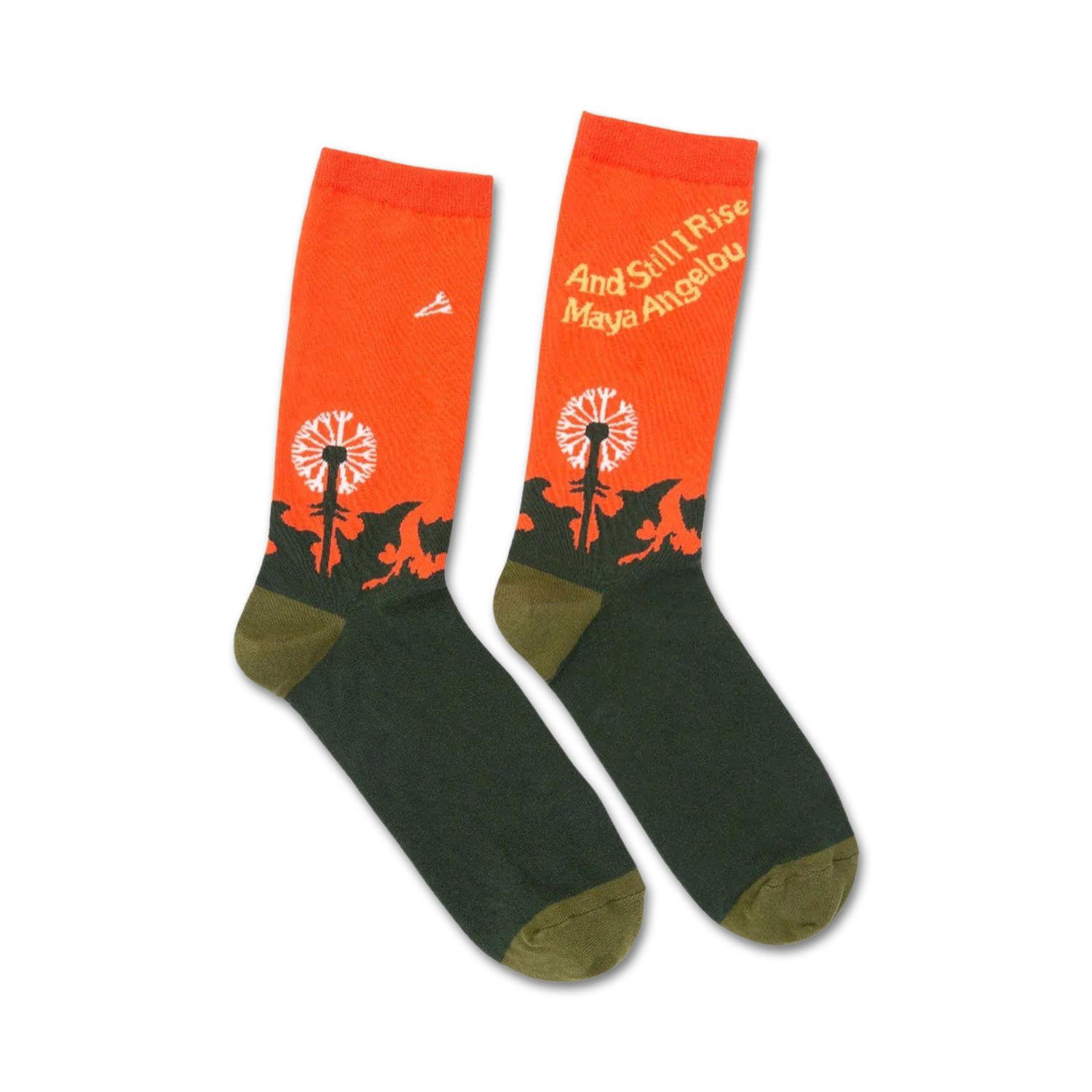 Pair of crew socks in orange and dark green.  The socks feature a dandelion graphic and the words "And Still I Rise" by Maya Angelou.