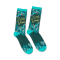 Crew socks in teal and dark green, featuring a floral pattern and 'Little Women' in gold lettering.