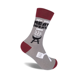 gray crew socks with black and red accents featuring grilling puns and designs.    