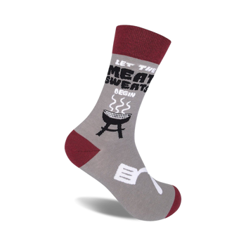 gray crew socks with black and red accents featuring grilling puns and designs.    