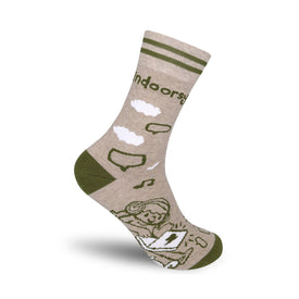  beige crew socks with "indoorsy" in green text and two green stripes, featuring a person wearing headphones and using a laptop with musical notes in speech bubbles, clouds, raindrops, and a lightning bolt.   