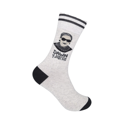 Grey crew socks with a black and white portrait of Ruth Bader Ginsburg, sunglasses, and the phrase 'Dawn of Justice'.