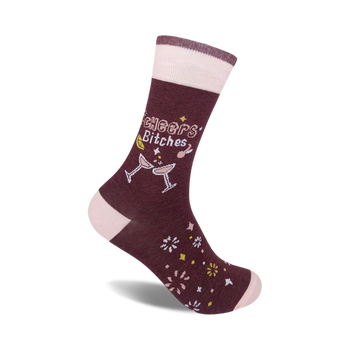 women's crew socks in light pink and brown with "cheers bitches" and champagne glasses design.   