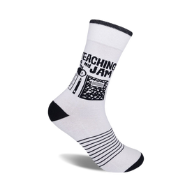 white crew socks featuring "teaching is my jam" with ruler & notebook accents. 
