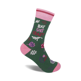 women's crew socks featuring the phrase "bat shit crazy" written in large red letters, surrounded by pink flowers, and finished with a touch of elegance - pink toes, heels, and stripes.   
