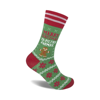 christmas crew socks in red and green feature 'merry christmas ya filthy animal' text with a candy cane striped top and a green snowflake background.  