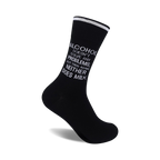 Black crew socks with a white slogan: 'Alcohol Doesn't Solve Any Problems, But Then Again Neither Does Milk'.