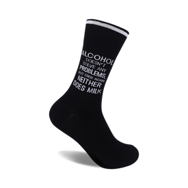 black socks with white text reading "alcohol doesn't solve any problems, but then again neither does milk". crew length.  