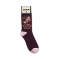 Lifestyle product shot showing maroon 'A Yawn Is A Silent Scream For Coffee' socks on a person's feet.