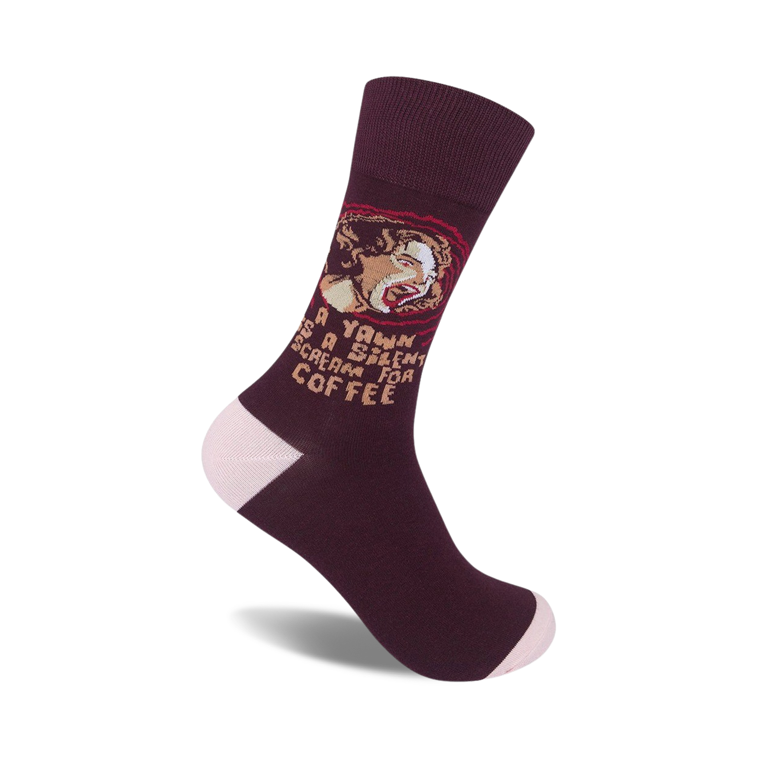 Maroon crew socks with a funny illustration of a person yawning and the text 'A yawn is a silent scream for coffee'.