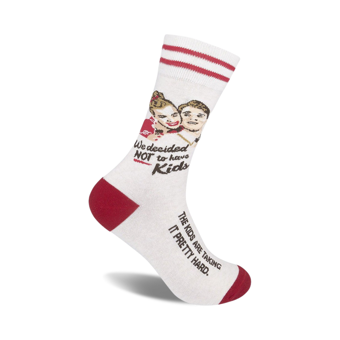 white crew socks with red stripes and cartoon man and woman. text reads 
