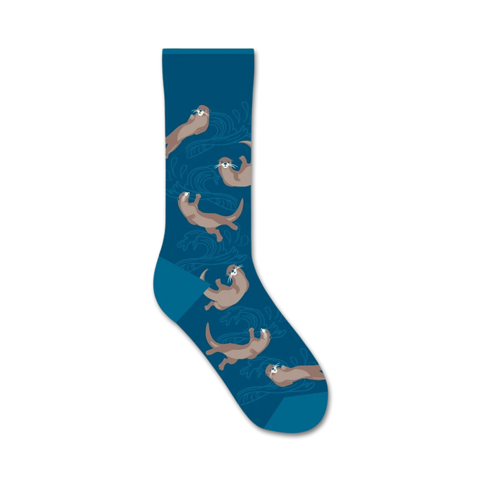 blue crew socks with a playful pattern of cartoon otters swimming in a wavy water design.   }}