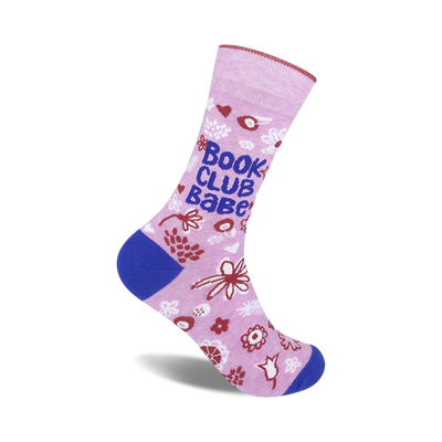 pink socks with blue accents, "book club babe" text, and a bookish floral pattern.  